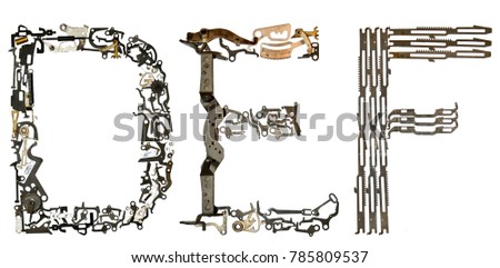 alphabet letters "D, E, F" assembled from metallic parts, isolated on white
