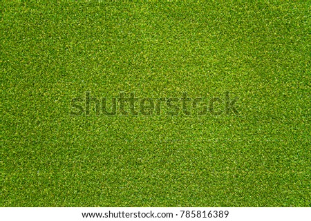 Artificial grass background, green grass texture.