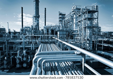 oil and gas refinery photographed at dawn Royalty-Free Stock Photo #785837530