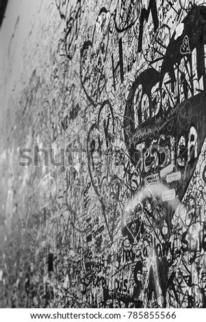 White Graffiti on black wall side view perspective love heart