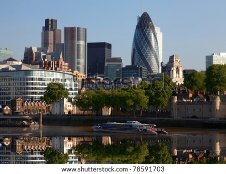 Modern London cityscape with boat, LONDON, UK