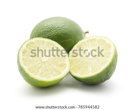 One lime and two halves isolated on white background
