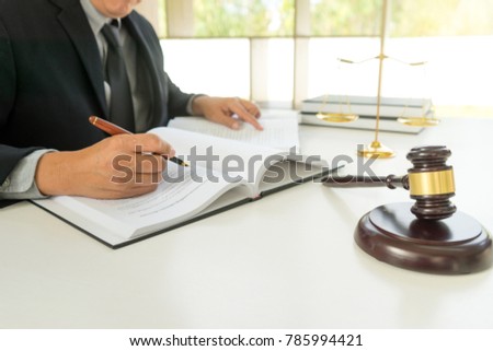 Judge lawyer gavel work in office with  balance  in law firm concept 