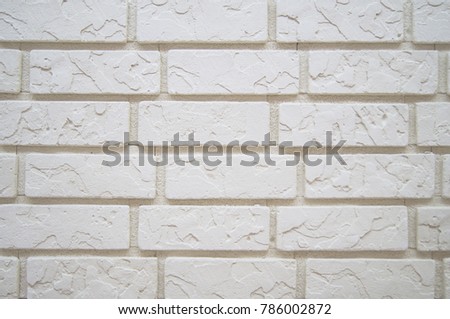 decorative wall of white bricks