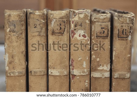 Row of old vintage books closeup old books for background