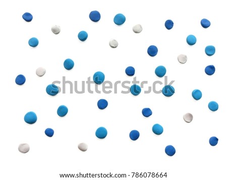 The blue and white  spots spread over the white background.