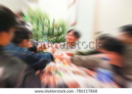 Blurred images of party between friends.