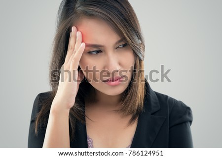 Working woman has Headache Against gray background, Think Over, Concept with Sickness and Healthcare.