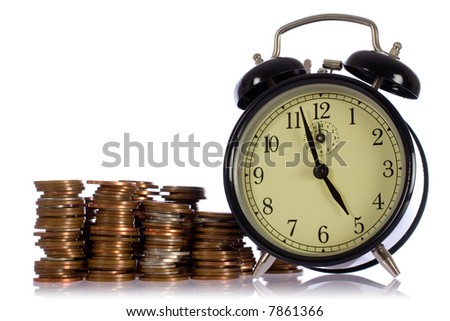 time is money concept photo, uk coins against retro alarm-clock
