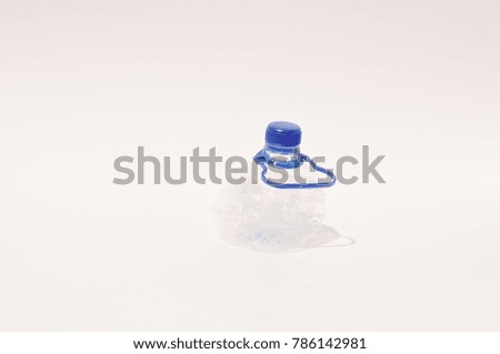 example of isolated clean and variety plastic bottles over the faded white background and selective focus used for recycle, reduce pollution