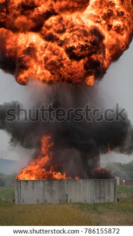 Hollywood style explosion.  Here is a picture of an EOD demolition using fuel to create a fireball.