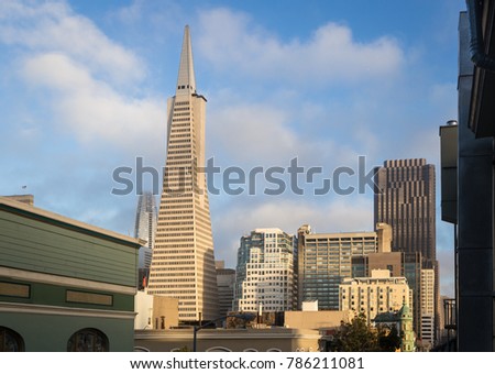 Sunset over San Francisco business district with the its famous architecture from the Telegraph Hill in California, USA