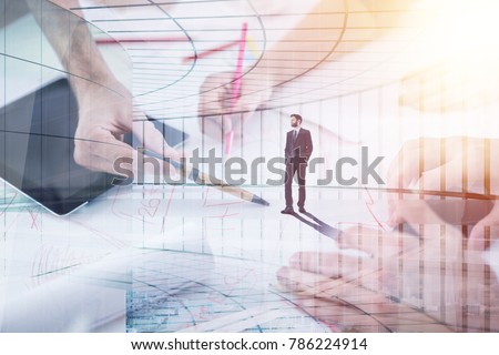 Abstract image of businesspeople hands working on project and businessman standing in glass office. Employment and lifestyle concept. Double exposure 