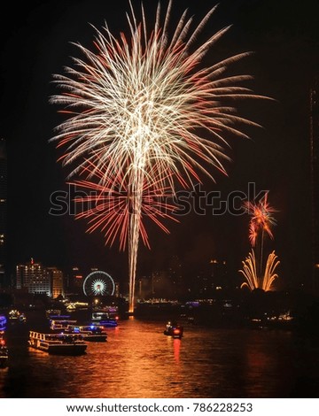 Fireworks to welcome the new year 2018 on the Chao Phraya River, Bangkok, Thailand, Most popular city in south asia.