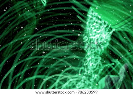 Abstract Green background with defocused bokeh lights, Blurred of colorful bokeh abstract on unfocused background with falling snow effect