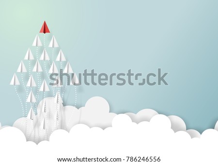 Paper airplanes in form of arrow shape flying from clouds on blue sky.Paper art style of business teamwork creative concept idea.Vector illustration Royalty-Free Stock Photo #786246556