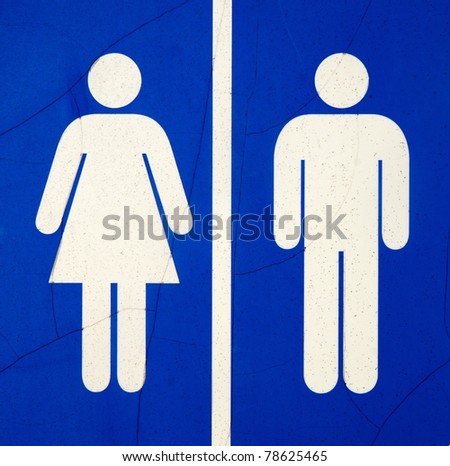 sign shows the way to the restroom