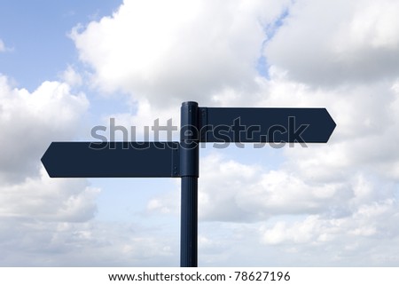 Blank road signs cloudy sky
