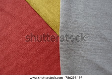 Yellow, orange and beige fabrics sewn together