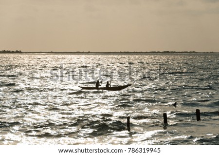 Small boat in Madagascar sunset
