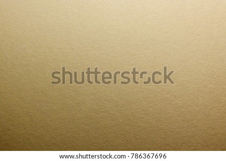 Macro. Texture of natural matte paper. Gold toning. Royalty-Free Stock Photo #786367696