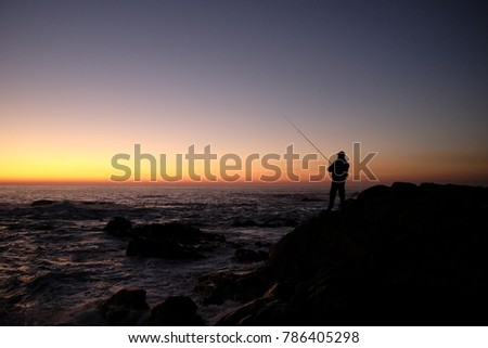 fisherman at sunset