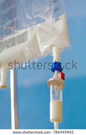Close up of Total Parenteral Nutrition (TPN) fluids bag on IV stand for feeding person intravenously, bypassing usual process of eating and digestion Royalty-Free Stock Photo #786449842