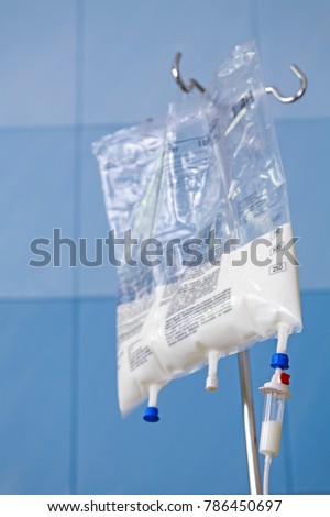 Close up of Total Parenteral Nutrition (TPN) fluids bag on IV stand for feeding person intravenously, bypassing usual process of eating and digestion Royalty-Free Stock Photo #786450697