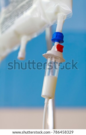 Close up of Total Parenteral Nutrition (TPN) fluids bag on IV stand for feeding person intravenously, bypassing usual process of eating and digestion Royalty-Free Stock Photo #786458329