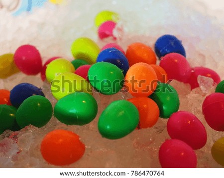 Easter Eggs, Plastic Bright Egg Assortment. On the ice.