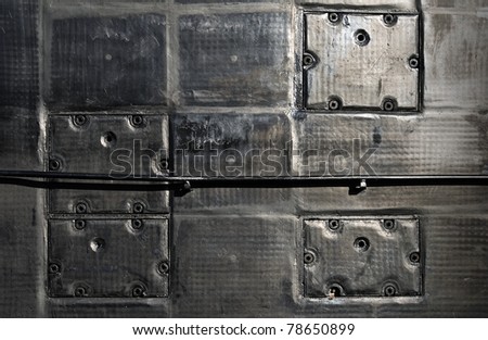 Modern military submarine fragment:panels on the wall of superstructure