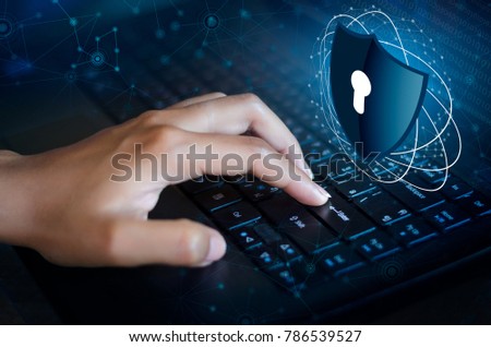 Press enter button on the keyboard computer Shield cyber Key lock security system abstract technology world digital link cyber security on hi tech Dark blue background, lock finger Keyboard Royalty-Free Stock Photo #786539527
