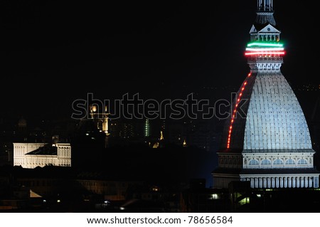 Mole antonelliana in Turin and city landscape, night view with 150th Italy union anniversary lights
