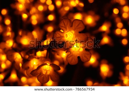 Christmas lights border. Glowing colorful Christmas lights on black background. New Year. Christmas. Decor. Garland.
This is a picture of decorative lights of a festive season  A beautiful Bokeh 