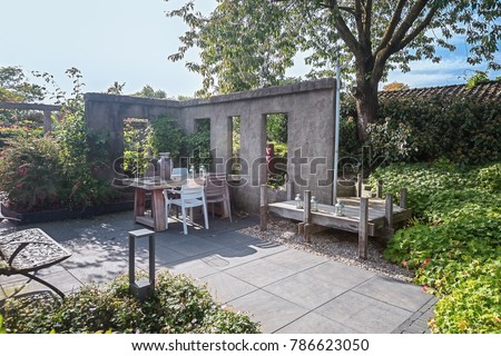 Apeltern, Netherlands, September 29, 2017: Characteristic patio with an opportunity to sit and relax