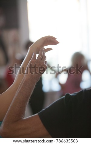 ,dancer hand. silhouette,on blured bg, dance performance improvisation
