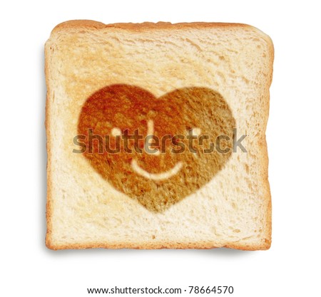 heart face on toasted bread isolated on white background