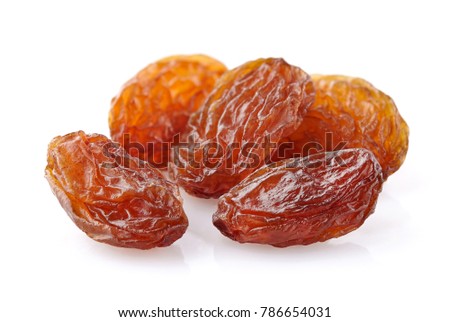 Raisins in closeup on a white background