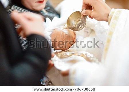 Baptism ceremony in Church. Royalty-Free Stock Photo #786708658