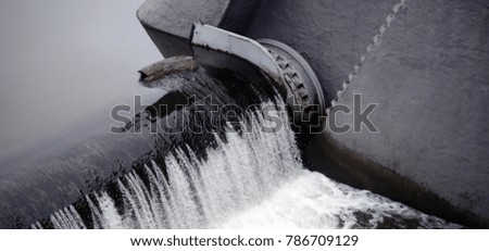 A picture of the flowing water. The dam is designed to regulate the water level in rivers within the city and to provide technical water to industrial objects