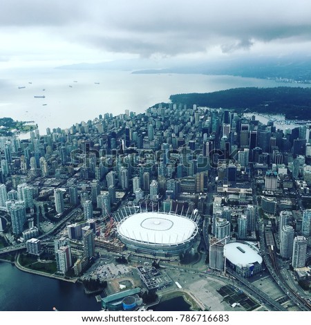 Aerial photo of the Vancouver skyline including the Rogers Centre and BC Place Royalty-Free Stock Photo #786716683