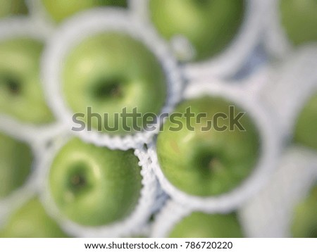 Blurred green apple background. Blurred picture. Blurred Background.