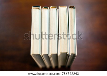a stack of books on the table