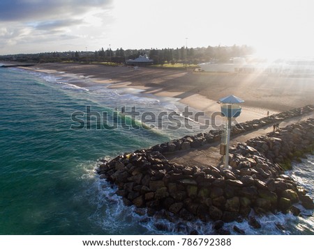 Drone photo of the rock groyne and coastline of City Beach, Perth, Western Australia