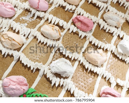 Colorful Meringue on Brown Background
