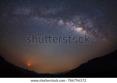 Night photography in Phitsanulok. Milky way galaxy with moon and space dust in the universe