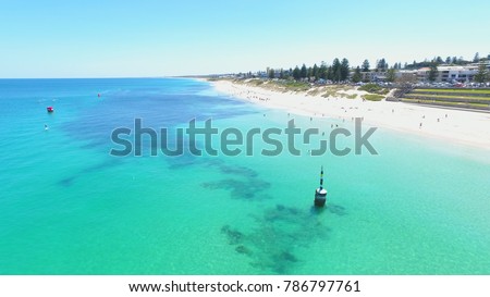 Drone photo of bright blue ocean at Cottesloe Beach, Perth, Western Australia