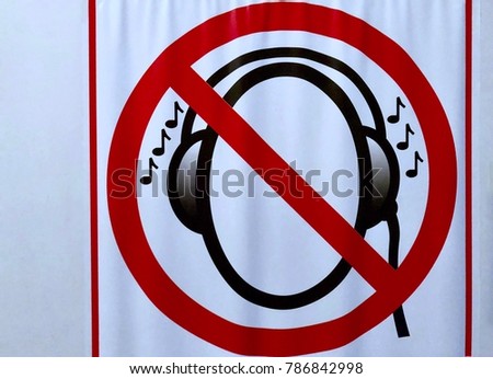 symbol on a wavy sheet of white paper, you can not listen to music on headphones