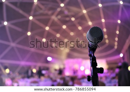 microphone close up on stage in the evening Royalty-Free Stock Photo #786855094
