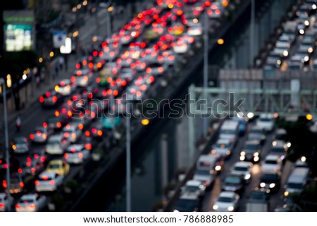 Blurred of Many cars on the road, traffic jam in the city and Bokeh blurred background